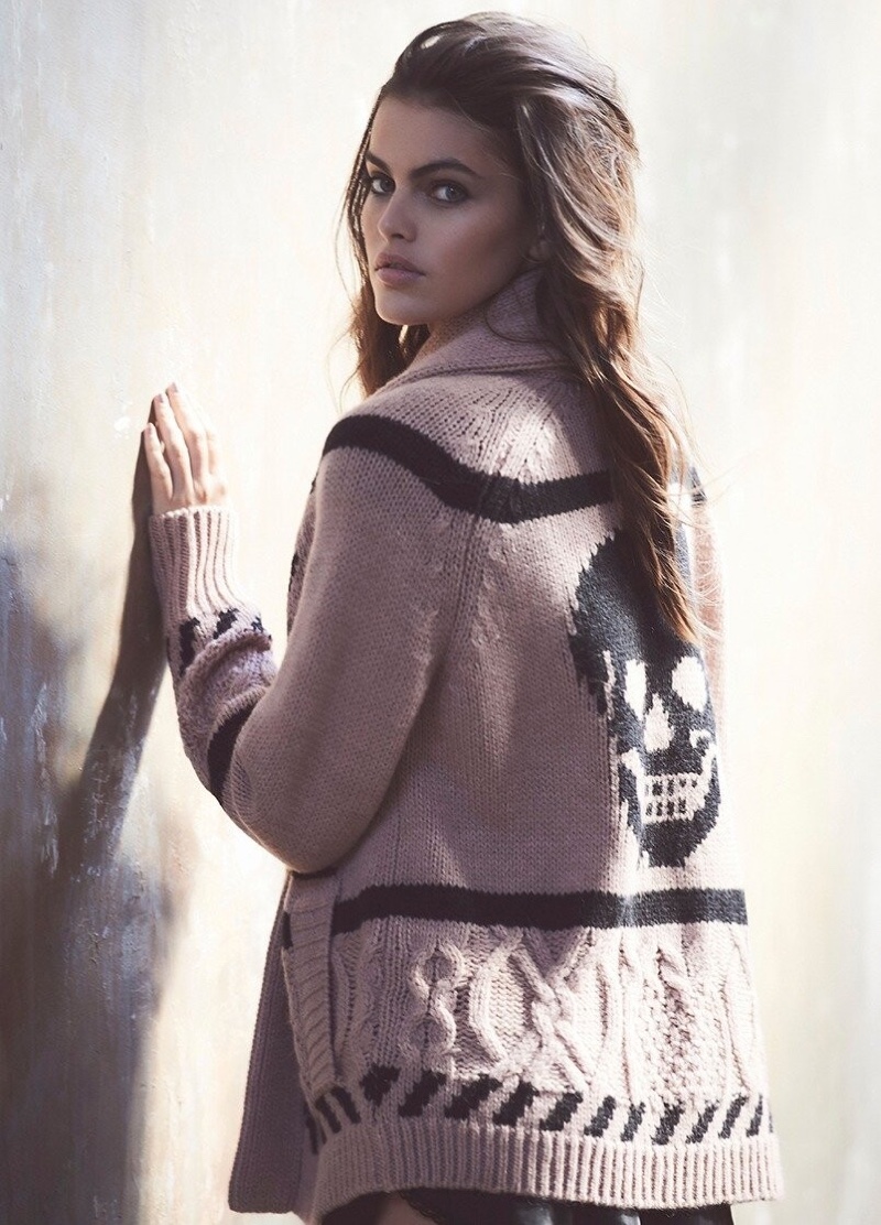 Kamila Hansen wears Lou cardigan sweater from Skull Cashmere