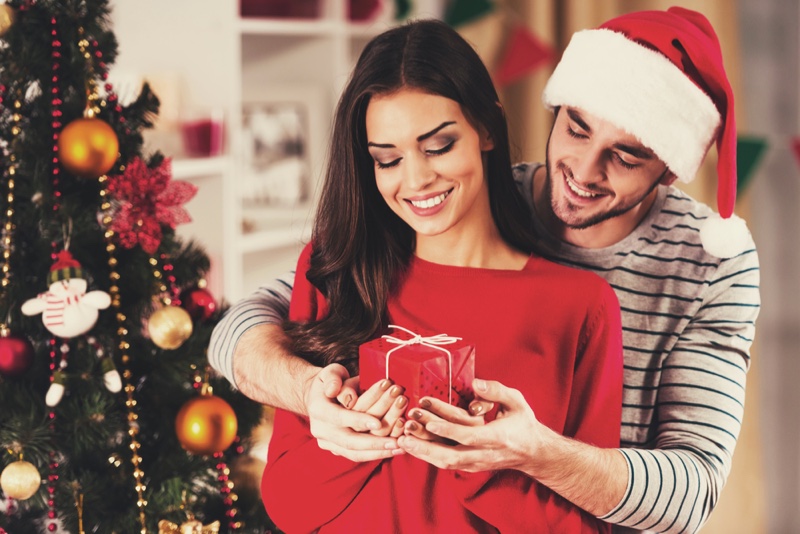 Model Couple Christmas Tree Santa Hat Gift