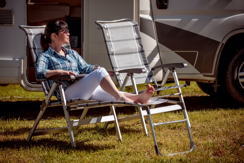 Outdoors Woman RV Chairs Plaid Shirt Relaxing