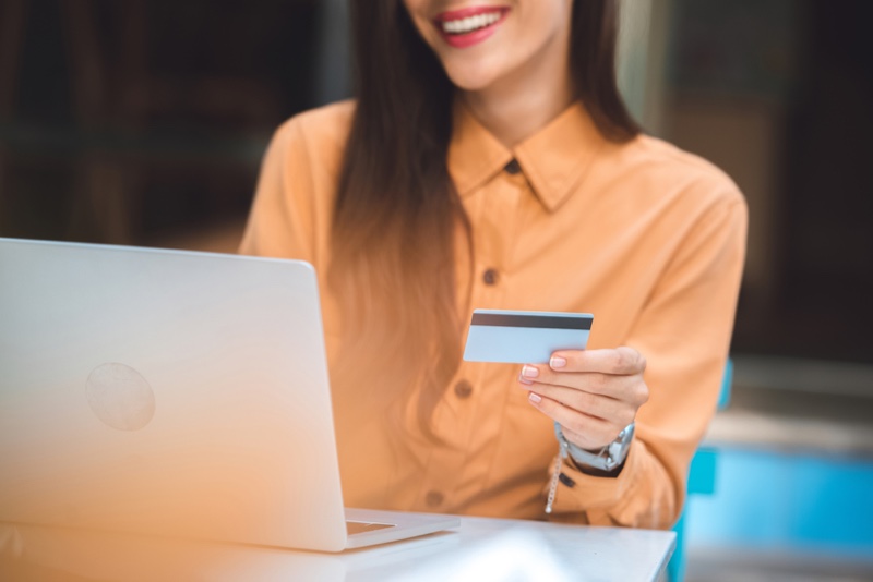 Woman Shopping Laptop Smiling Credit Card