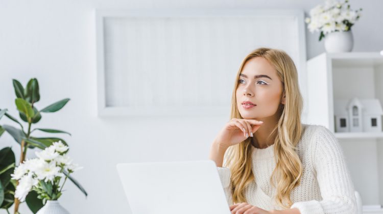 Buying High-End Clothes Online Woman Thinking About Shopping Online