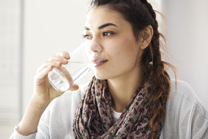 Attractive Woman Drinking Water Scarf Braid