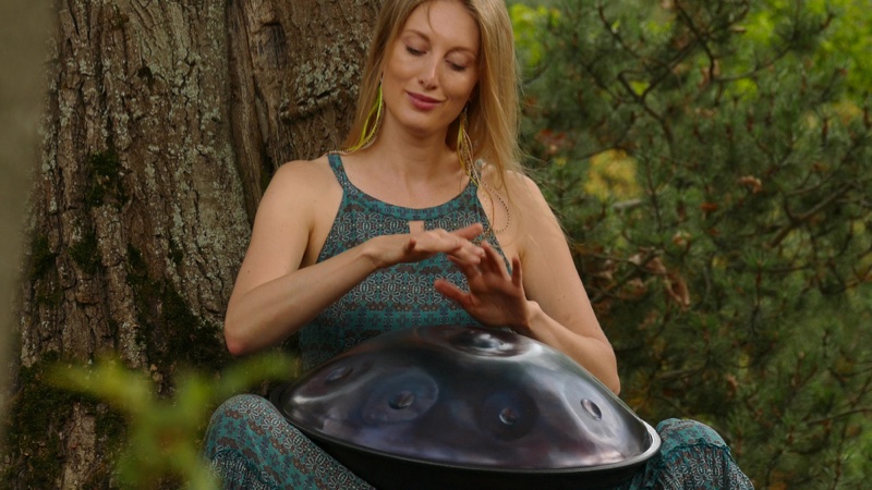 Attractive Woman Outside Playing Handpan