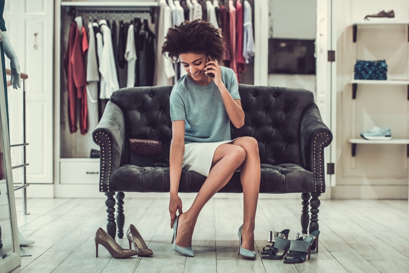 Black Woman Trying On Heels Afro Hairstyle