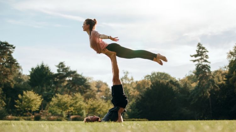 How Acroyoga Can Benefit Your Life Couple Acroyoga Park Grass