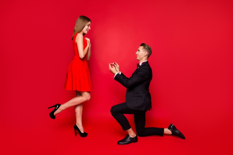 Couple Proposal Man Bended Knee Woman Red Dress