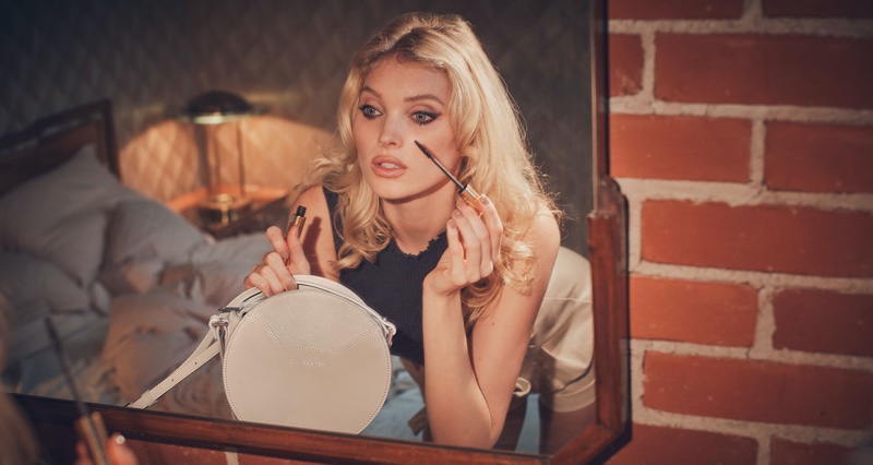 Doing her makeup, Elsa Hosk appears in Lancaster spring-summer 2020 campaign.