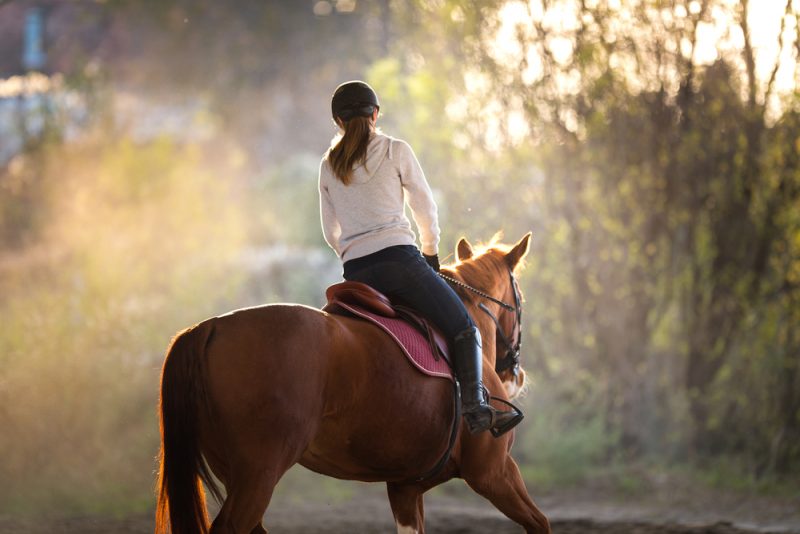 Girl Riding Horse