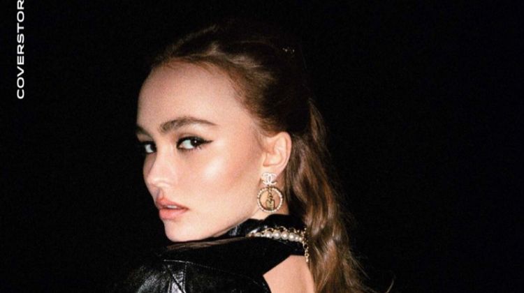 Actress Lily-Rose Depp poses in Chanel dress, necklace and earrings