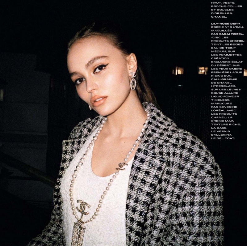 Actress Lily-Rose Depp poses in Chanel ensemble