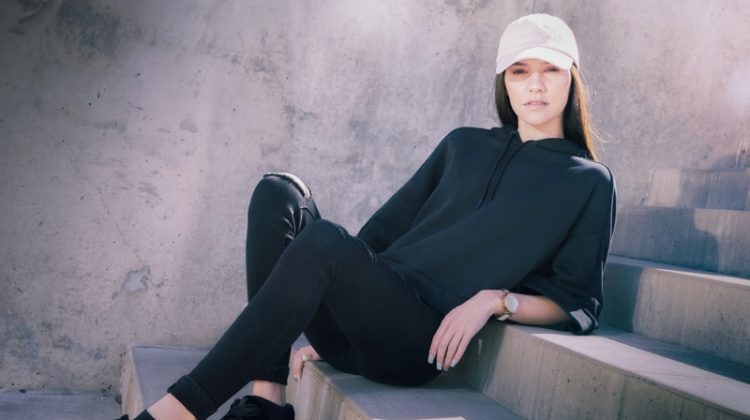 Stylish Apparel & Accessories Set a New Trend in the Sports World Model Stairs Athleisure Black Hoodie Cap Sneakers