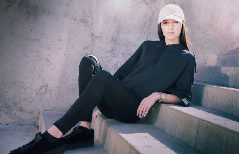 Model Stairs Athleisure Black Hoodie Cap Sneakers