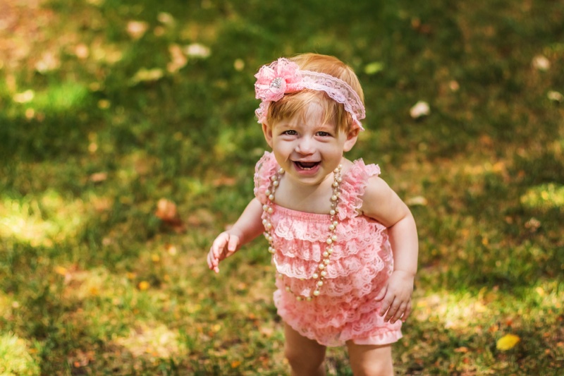 Outdoors Smiling Toddler Pink Romper