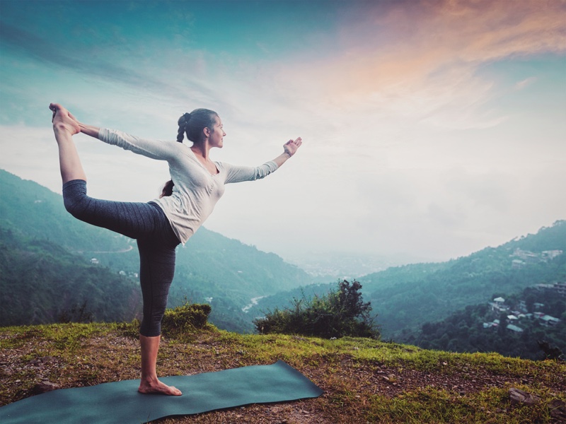 Practicing Yoga Outdoors Pose Woman