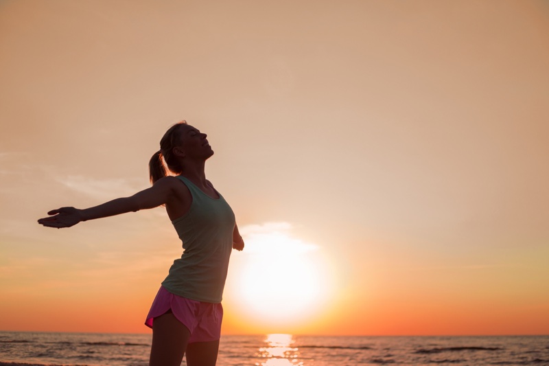 Woman Outdoors Beach Tank Top Running Shorts Sunset