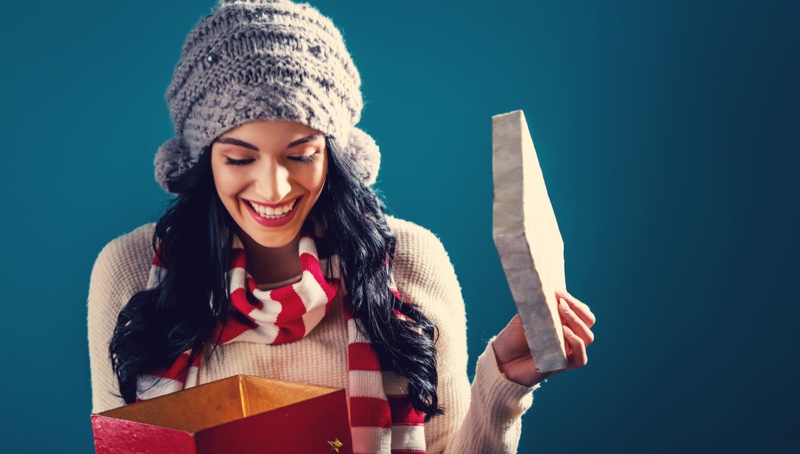 Woman Smiling Opening Gift Christmas Theme Winter