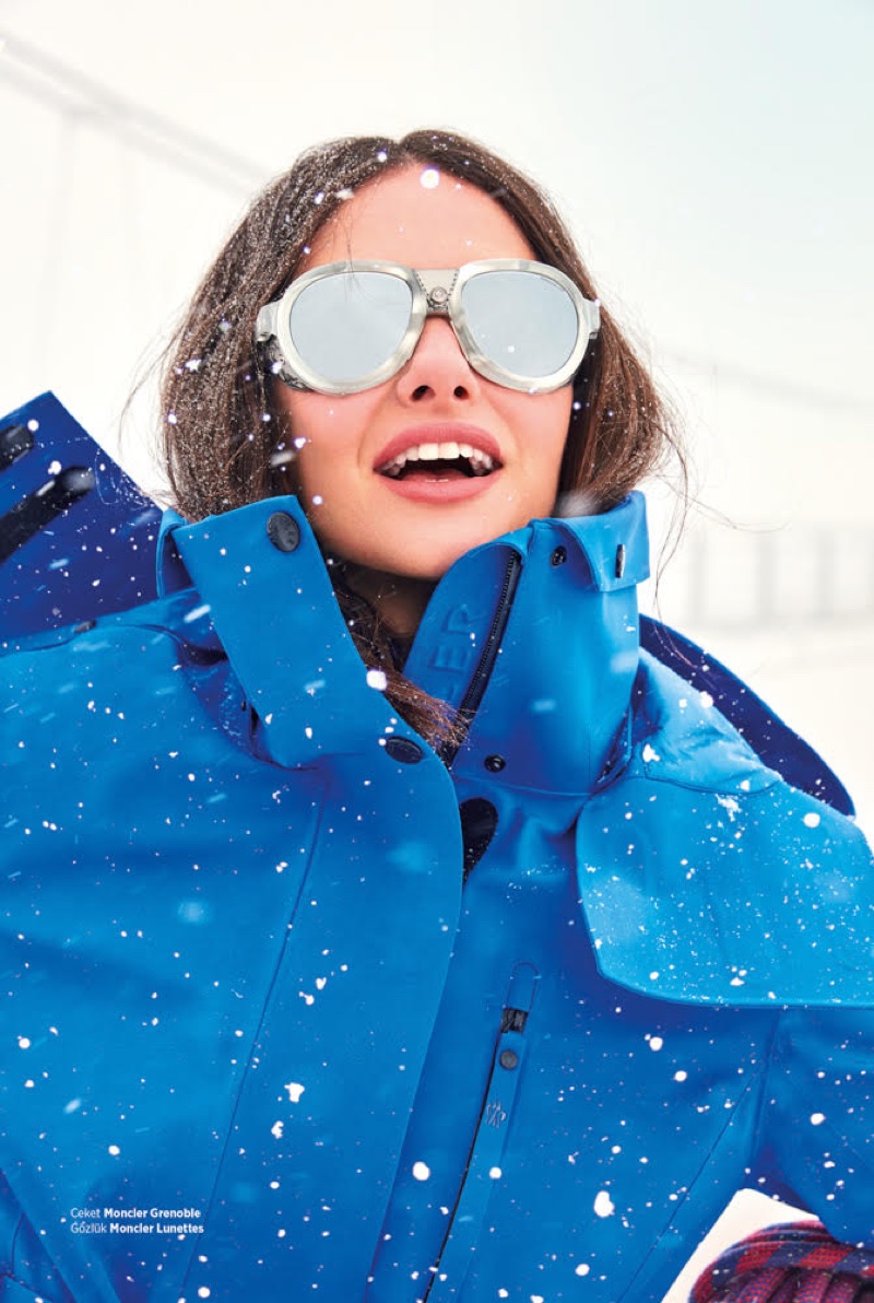 Actress Yasemin Ozilhan wears Moncler Grenoble coat and Moncler Lunettes sunglasses