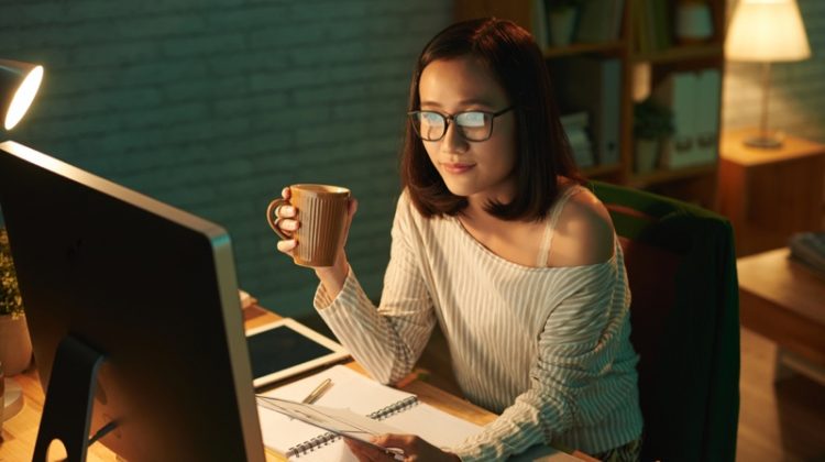 How to be More Productive: 10 Productivity Tips for Women Asian Woman Working Night Computer Cup Glasses