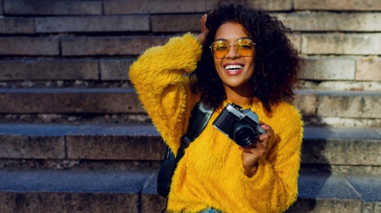 Top 4 Сommon Wardrobe Mistakes Female Students Should Avoid Black Woman Yellow Sweater Jeans Camera