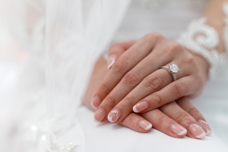 Closeup Bride's Hands Diamond Ring