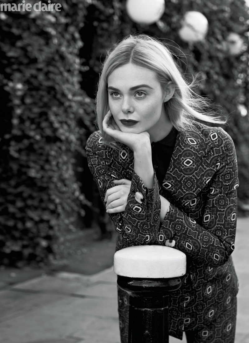 Elle Fanning poses in Prada jacket, top and pants