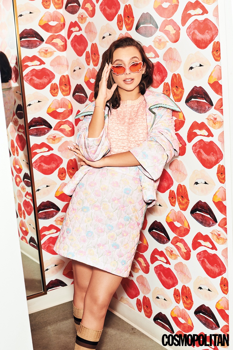 Youtuber Emma Chamberlain wears Fendi jacket, top, skirt and socks with Anna Sui sunglasses