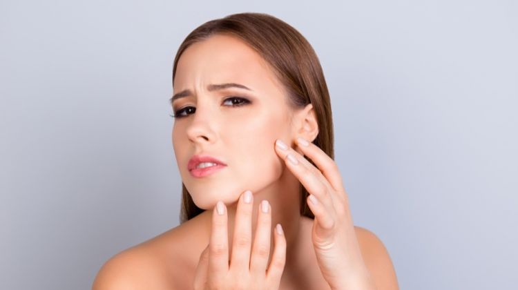 Everything You Need to Know About Cystic Acne Girl Worrying Face