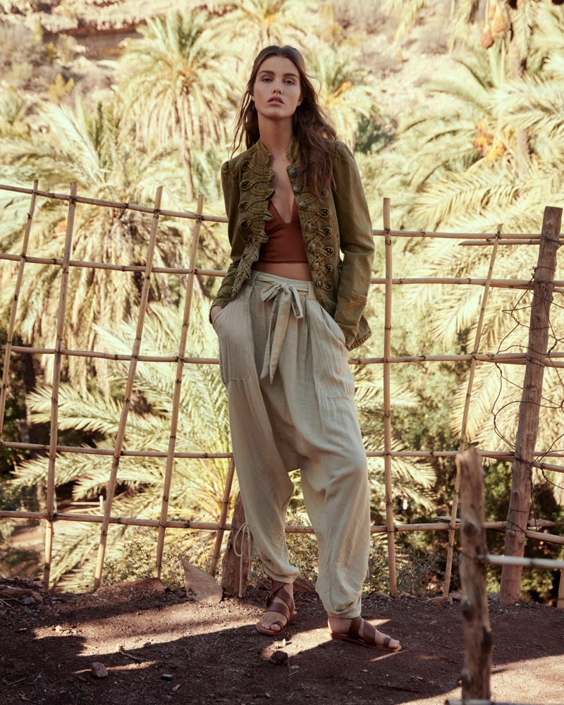 Model Luna Bijl poses in harem pants for Free People's January 2020 catalog