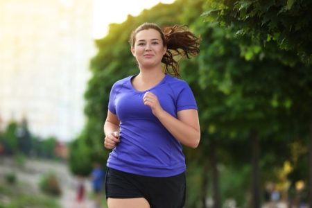 Obesity: Why It Happens, Its Associated Conditions, and How To Fix It Plus Size Woman Running Shorts Blue Tee