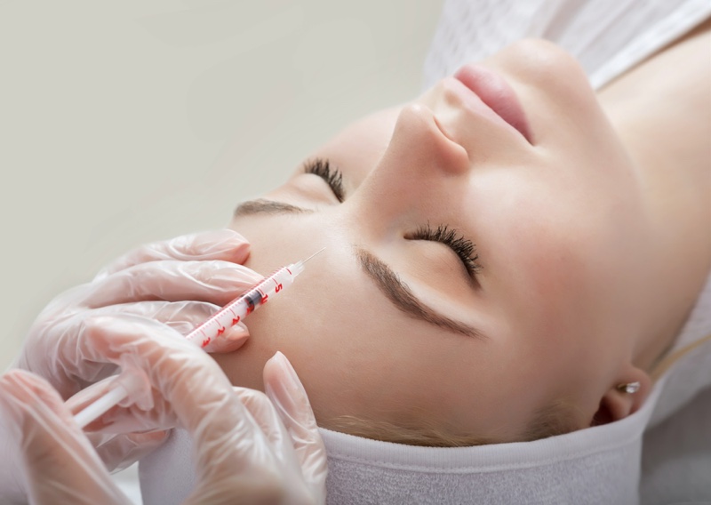 Woman Getting Botox Injection Needle