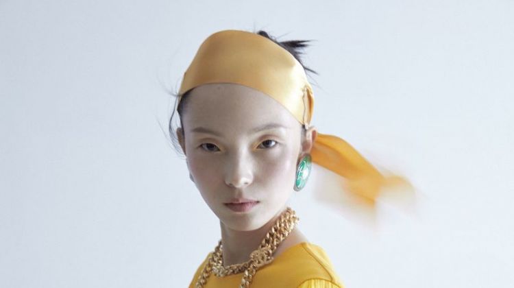 Xiao Wen Ju Poses in Elegant Ensembles for ELLE China