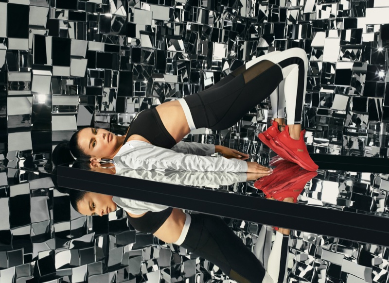 Supermodel Adriana Lima wears red sneakers from PUMA LQD Cell Shatter Mid line