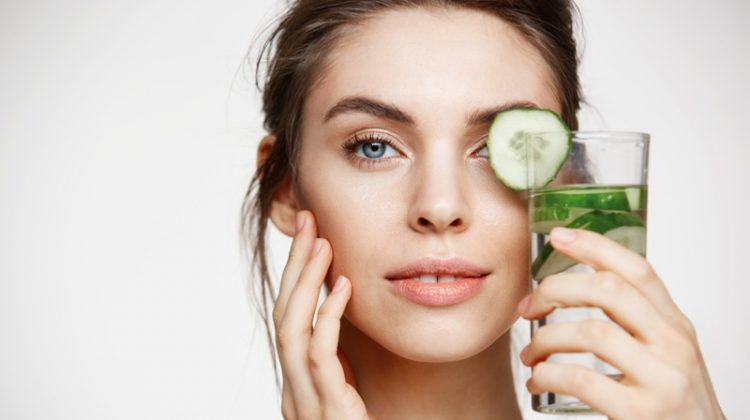 5 Essentials for Beautiful Skin Beauty Model Holding Cucumber Water