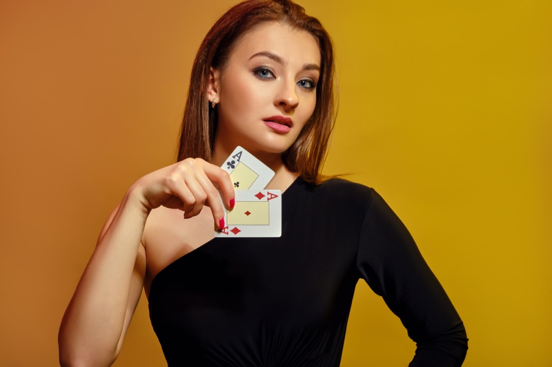 Black Dress Woman Holding Cards