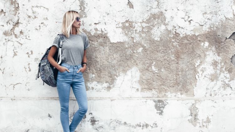 What to Wear When Getting Your Hands Dirty Blonde Model Grey T-Shirt Jeans Backpack
