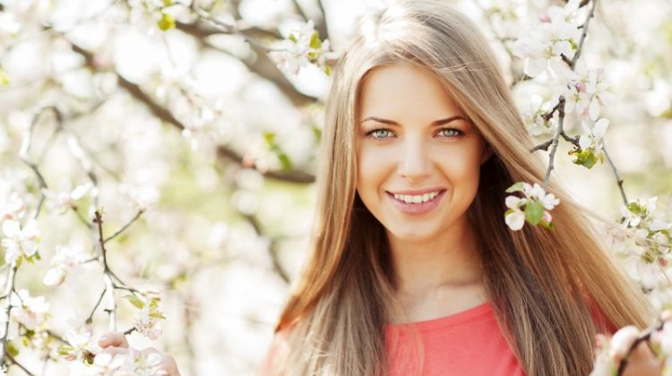 Skincare Tips for Wherever Your Spring Vacation Takes You Blonde Model Smiling Spring Beauty Makeup