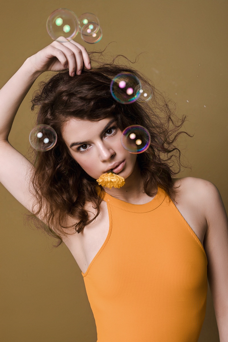 Brunette Model Neon Orange Top