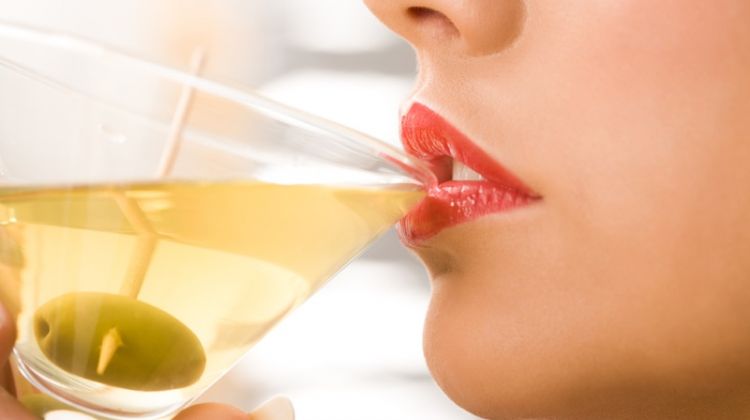 Five Classic Cocktails and What They Say About You Closeup Woman Drinking Martini Lips Olives