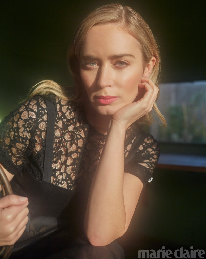 Emily Blunt poses in black lace Chanel dress