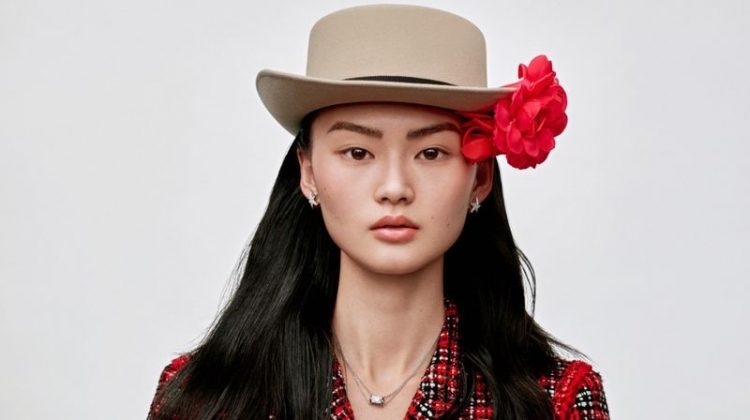 He Cong Poses in the Spring Collections for ELLE China