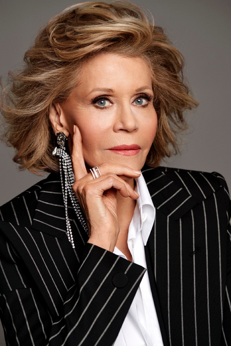 Photographed by Max Abadian, Jane Fonda wears pinstripes