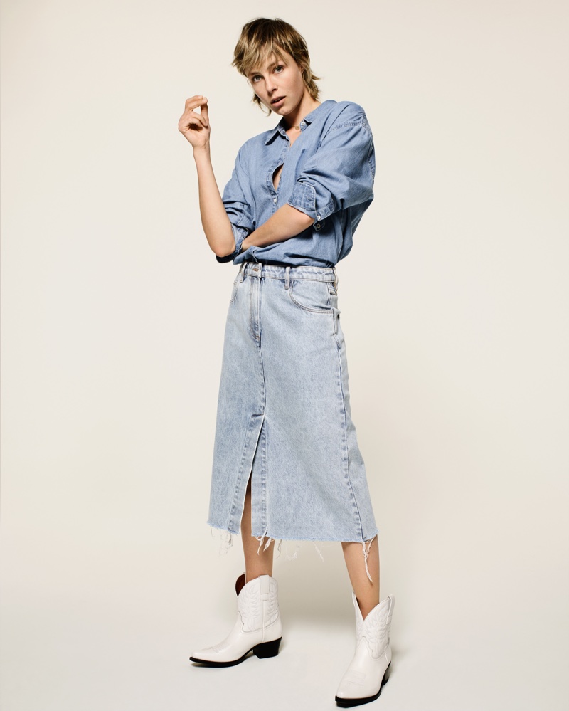 Edie Campbell poses in Mango Committed denim collection