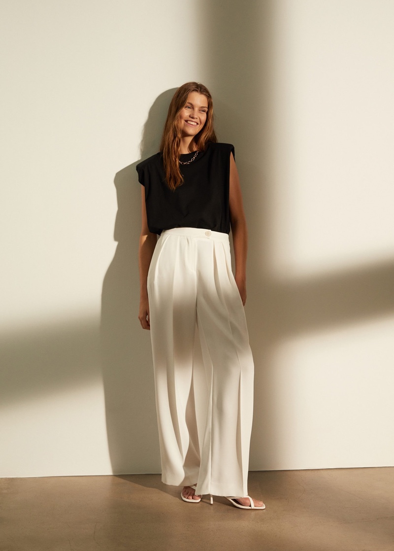 Luna Bijl wears Mango sleeveless top and palazzo trousers