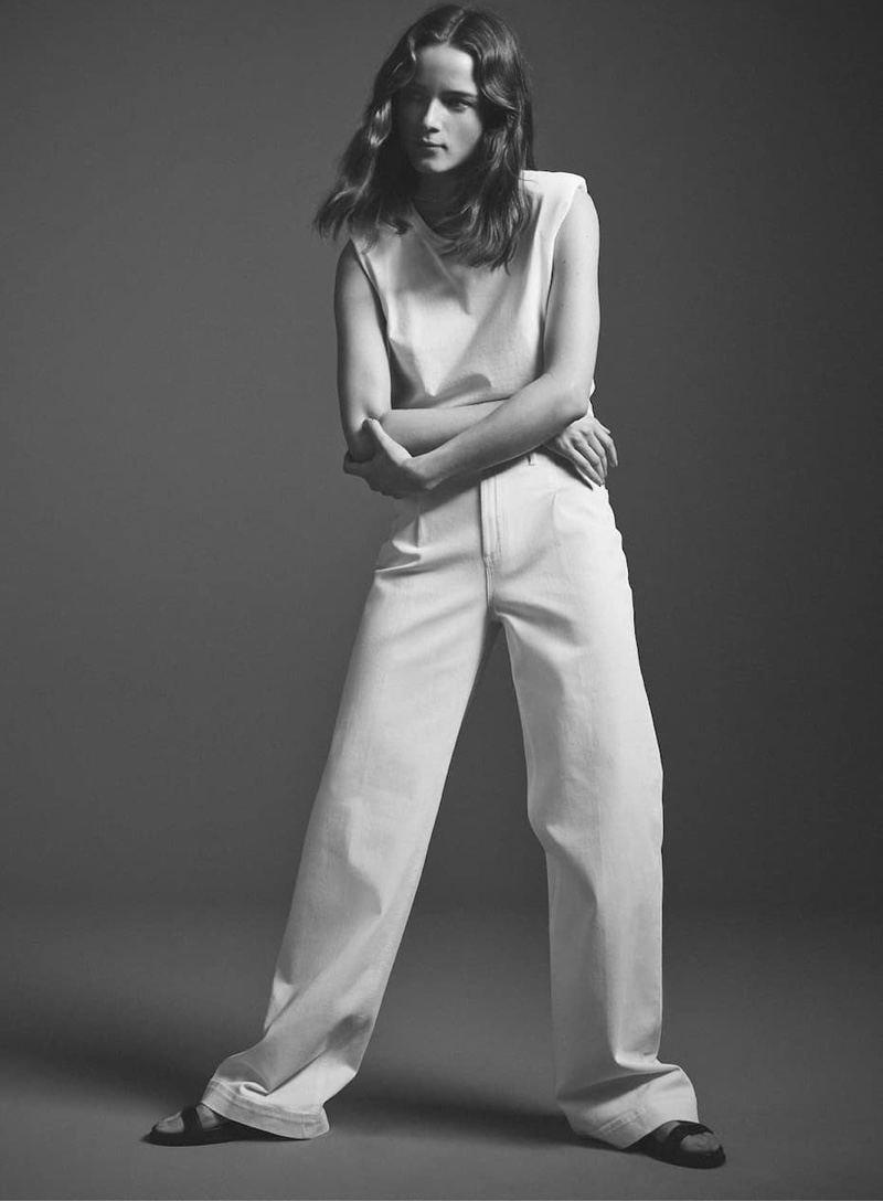 Dressed in white, Anna de Rijk models Massimo Dutti's spring styles