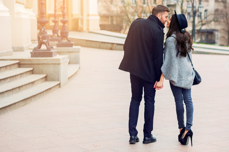 Stylish Couple Holding Hands