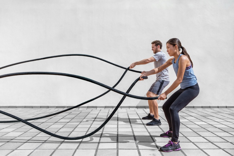 Woman Man Working Out Ropes