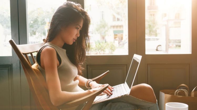 7 Self-Care Tips to Maintain a Healthy and Youthful Look in College Asian Woman Studying Laptop Jeans