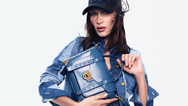 Model Bella Hadid poses in denim for MICHAEL Michael Kors spring-summer 2020 campaign