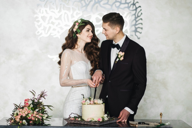 Bride Groom Smiling Wedding Cake Flowers