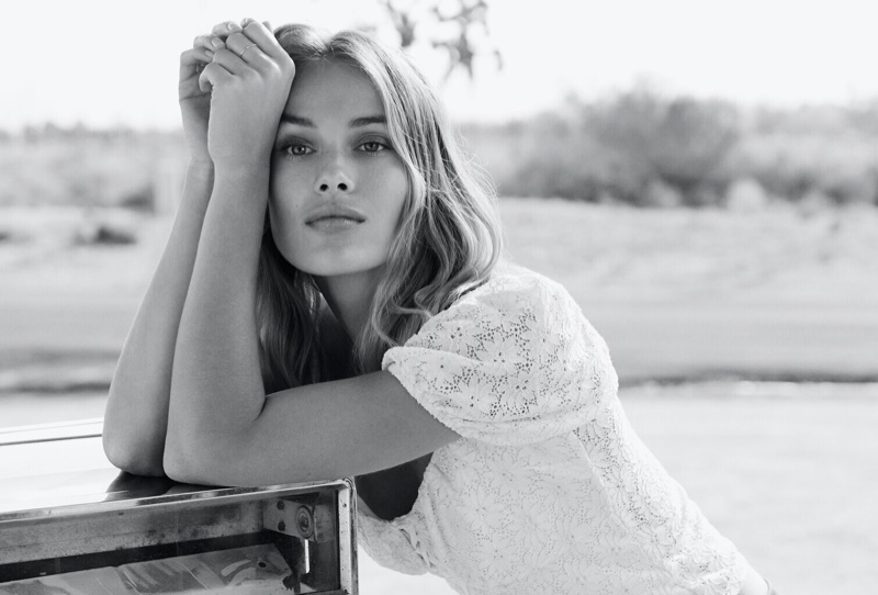 Rozanne Verduin poses in a white lace top for Buffalo Jeans spring-summer 2020 campaign